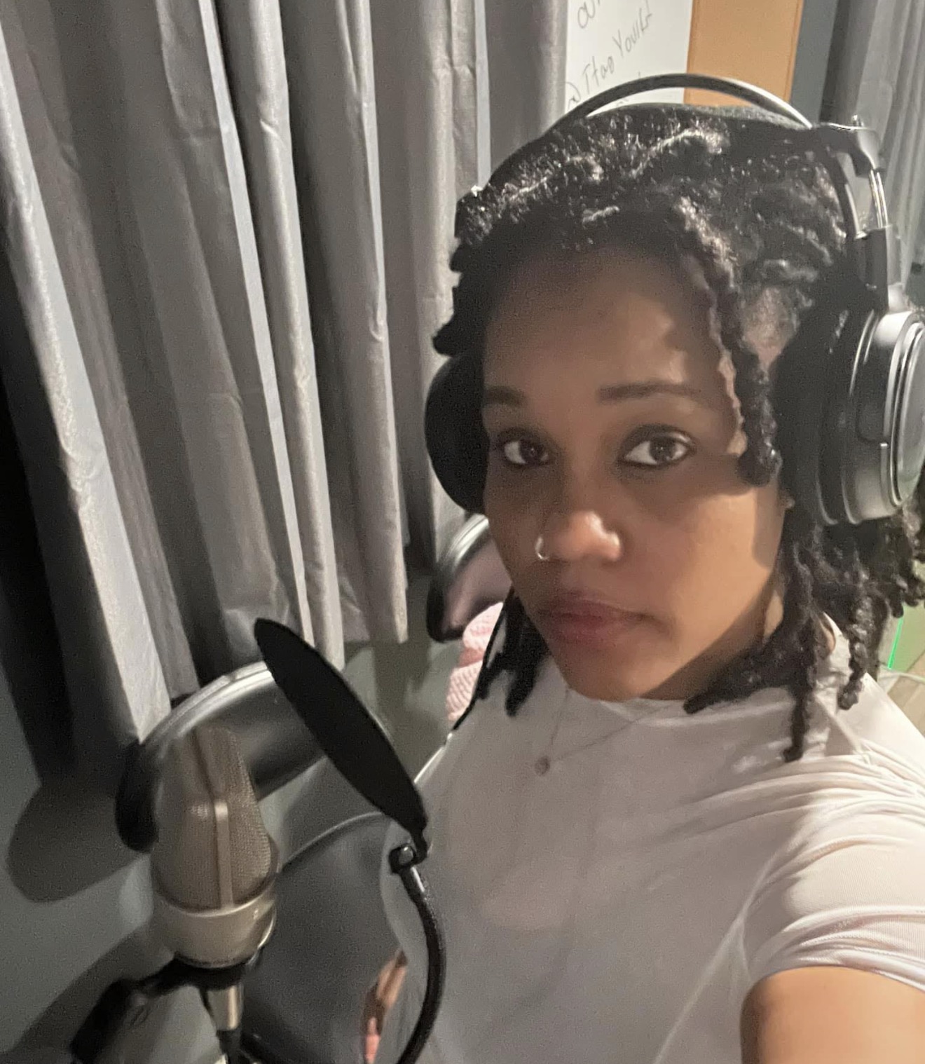 Vocalist recording in the studio
